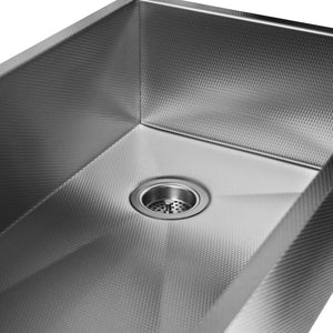 Undermount stainless steel farm house sink with a rear drain, USA made.