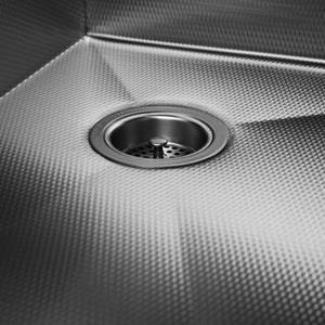 Textured stainless steel kitchen sink with right rear drain placement.