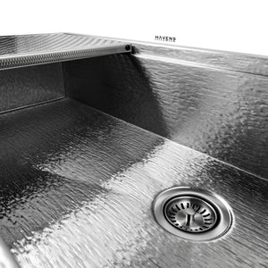 Kitchen sink drain assembly installed into Havens Royal Oak (wood grain) sink