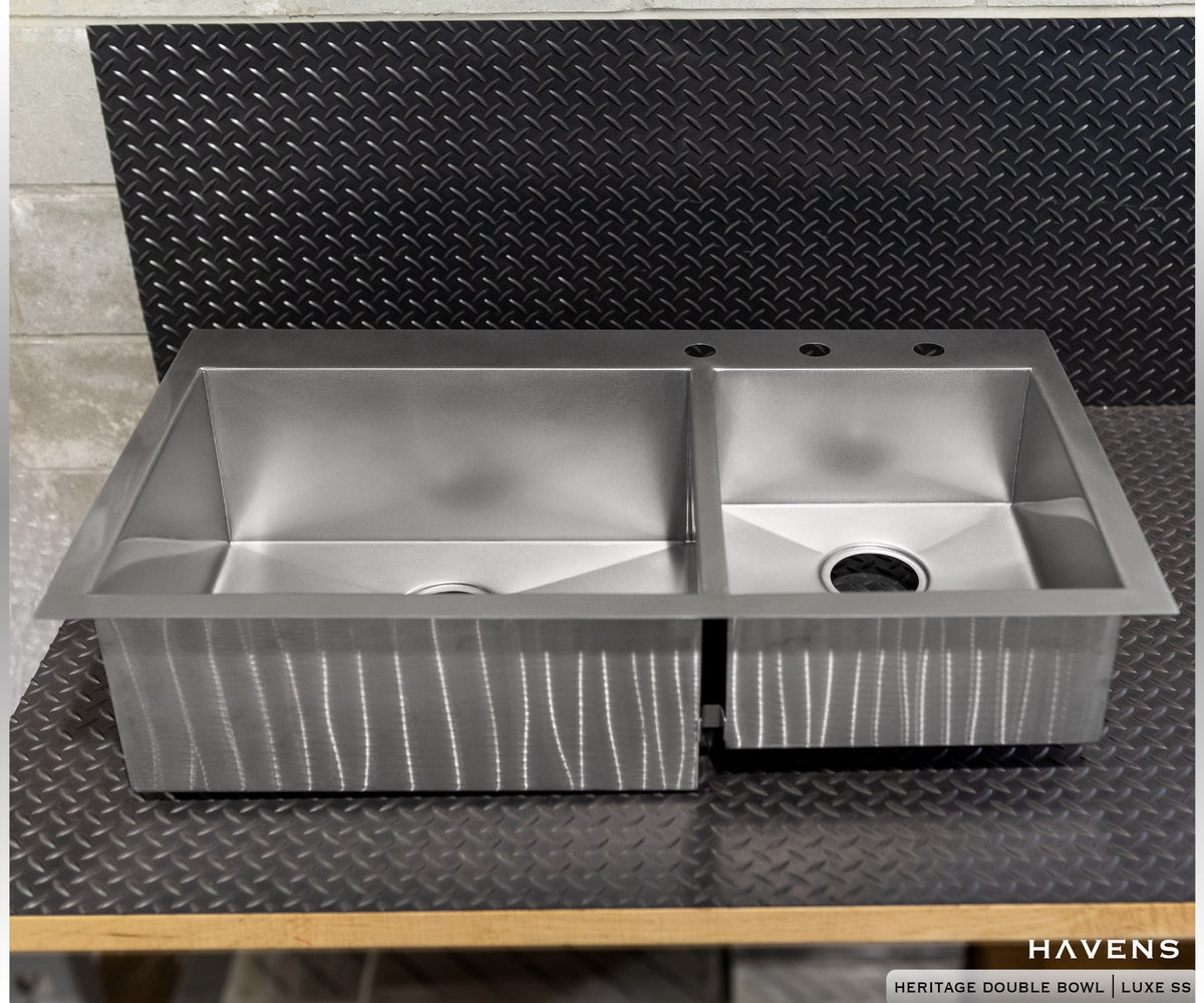 Double bowl stainless steel sink with large and small basins