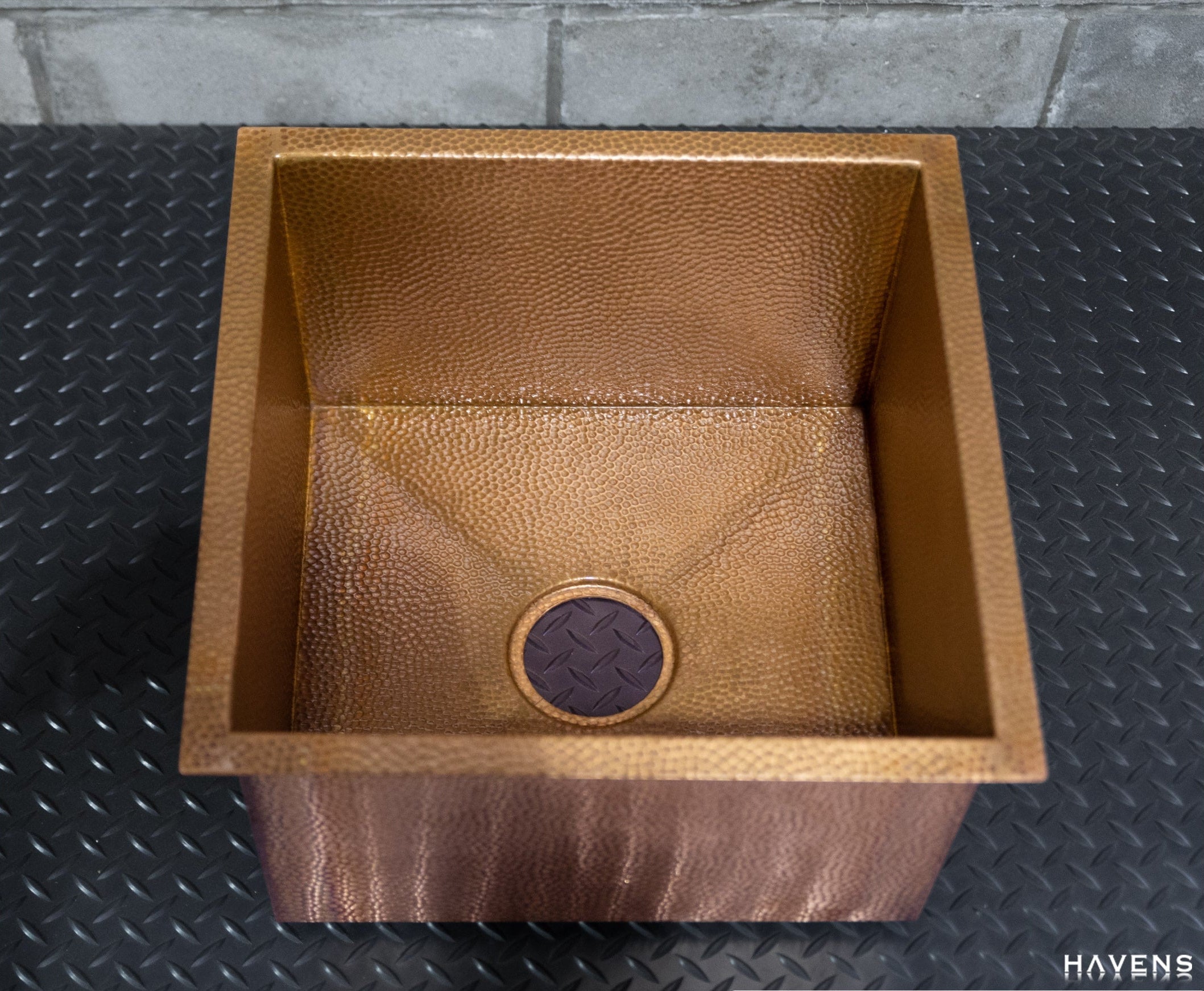 Micro Hammered pure copper prep sink, front view of basin and drain