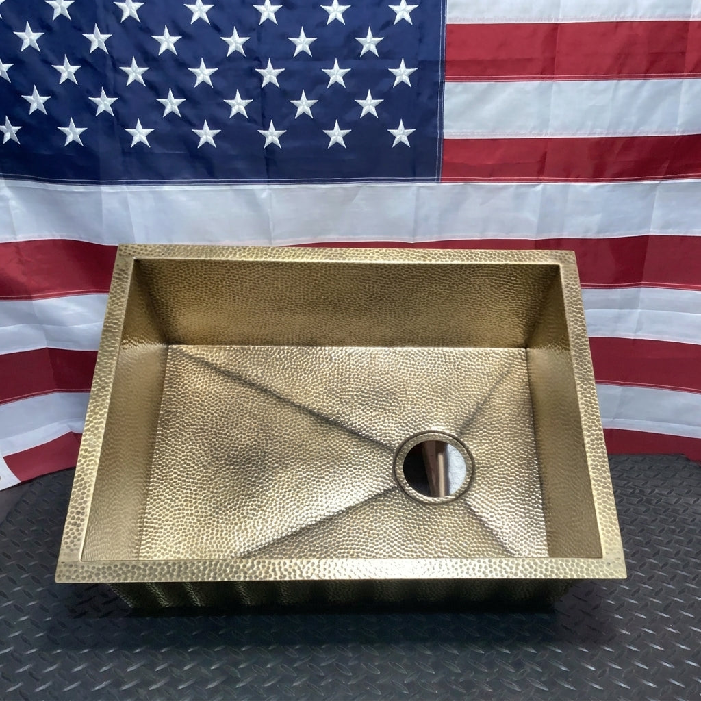 Micro hammered brass kitchen sink with right offset drain, angled view, made in the USA