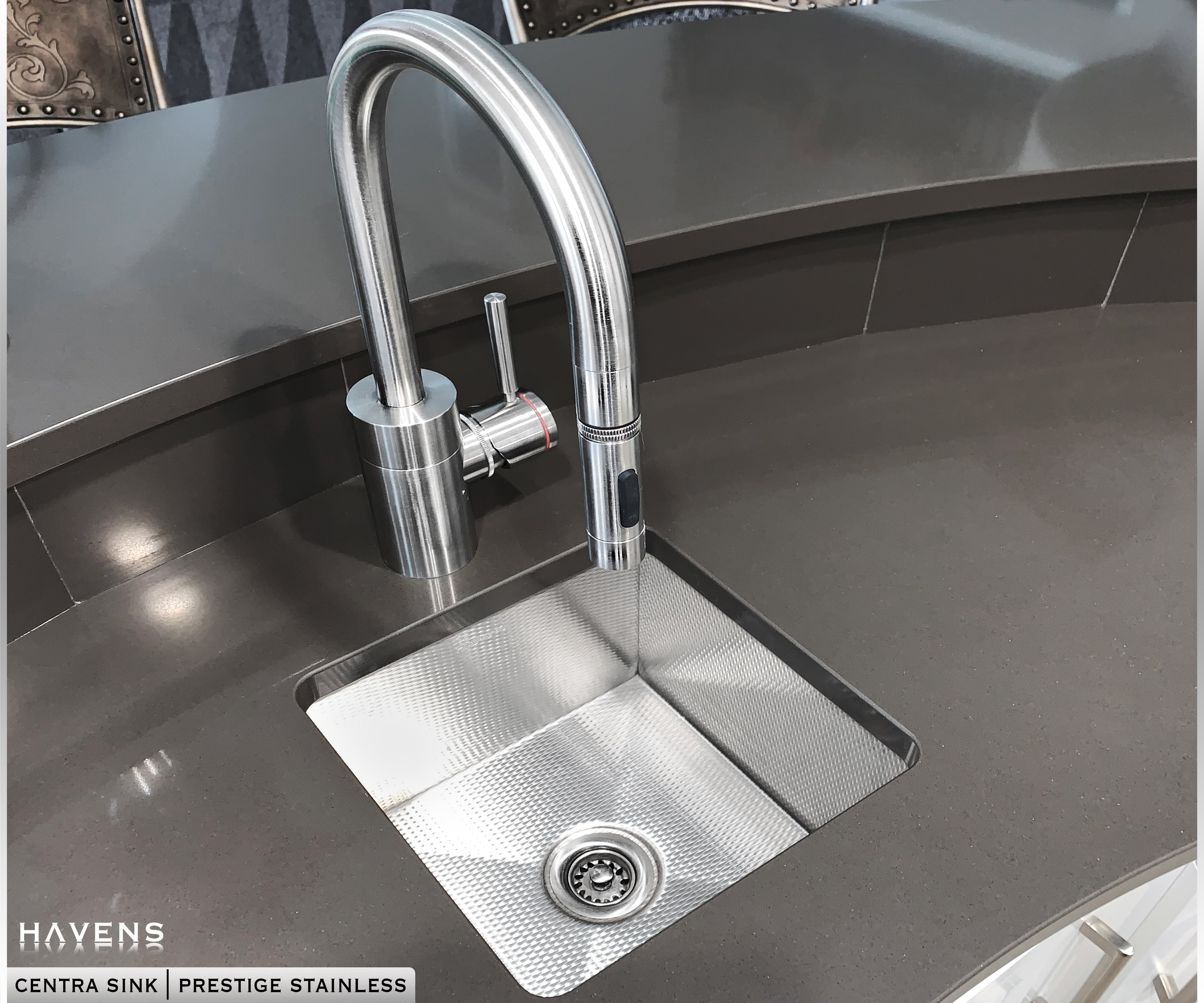 Prestige Stainless steel undermount sink in gray quartz countertop with chrome faucet