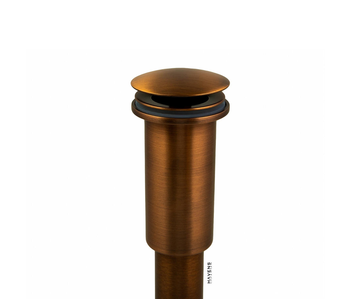 Copper bath drain with stationary round dome top