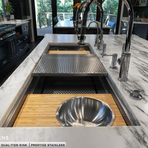 Mixing bowl cutting board on bottom ledge of Dual Tier Eclipse Sink in Prestige Stainless 