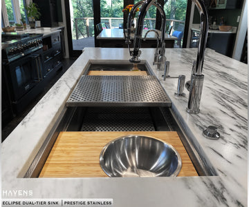Mixing bowl cutting board on bottom ledge of Dual Tier Eclipse Sink in Prestige Stainless 