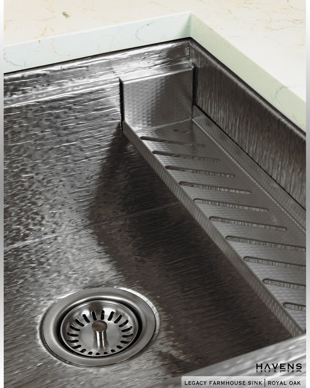 Havens signature Prestige Stainless Sponge Caddy shown on ledge of Royal Oak Stainless Workstation Sink 