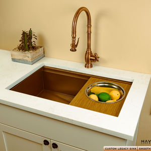 Havens Copper Sink with Amber Bamboo Mixing Cutting Board on sink ledge 