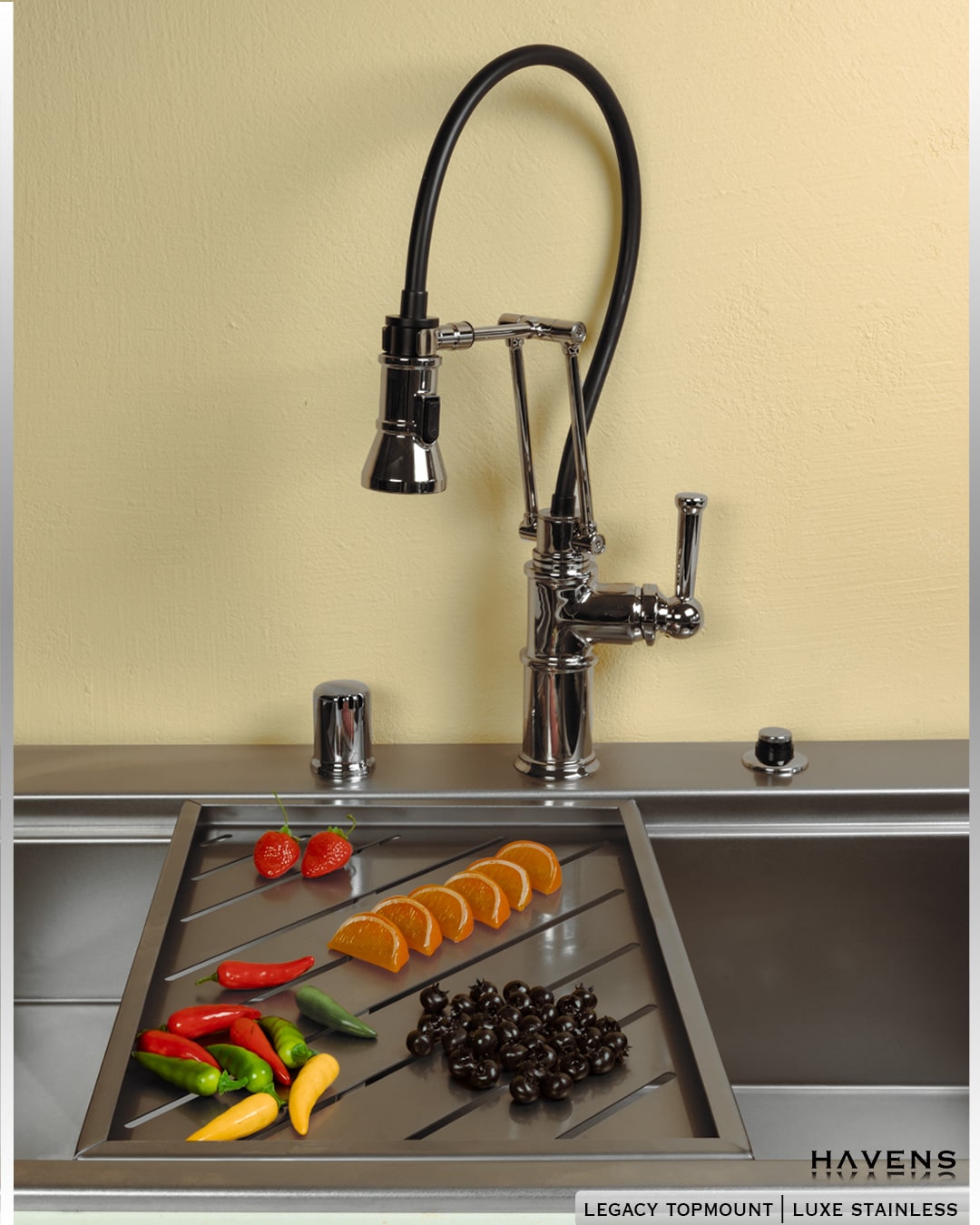 Drying rack advanced sink accessory being used to rinse fruits and veggies 