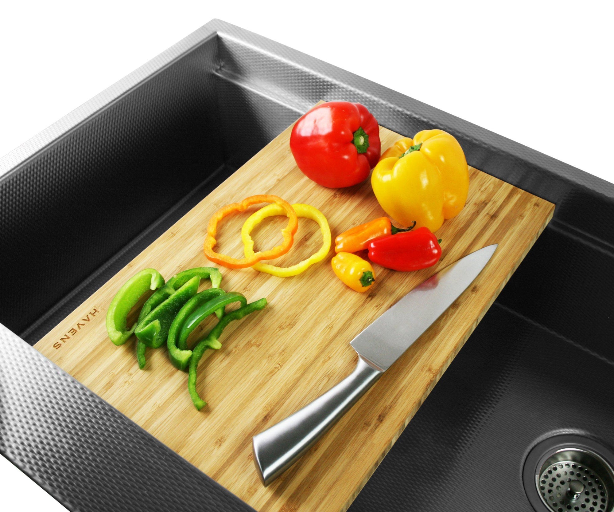 Light bamboo cutting board for stainless steel kitchen sink