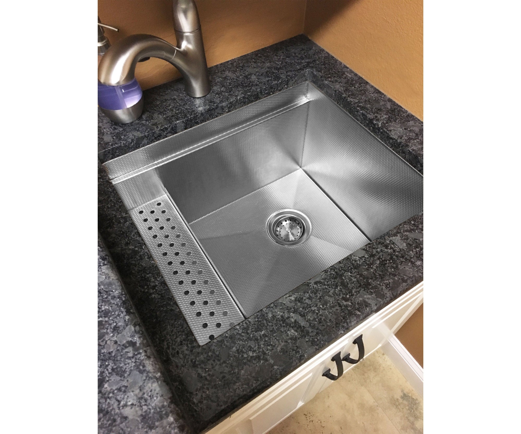 Textured stainless steel utility sink