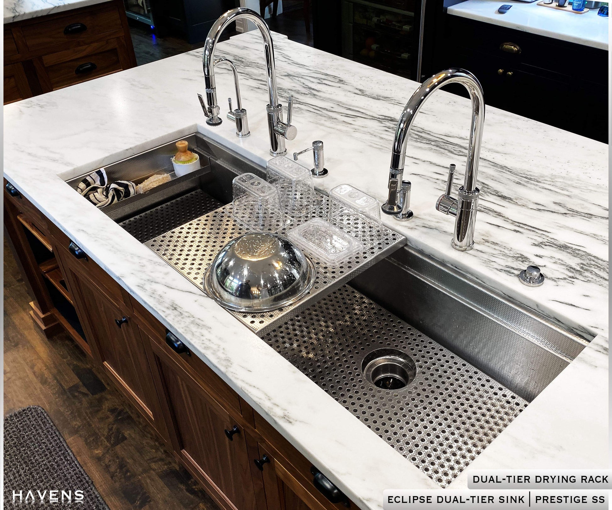 Stainless steel drying rack in the middle of a large eclipse sink 