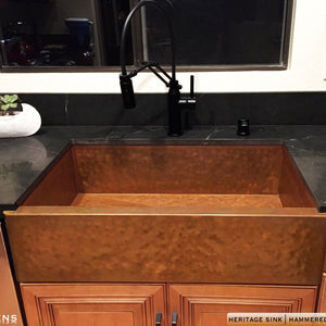 Hammered copper farmhouse sink made in USA from 14 gauge cold rolled 48pz copper. Patina artwork