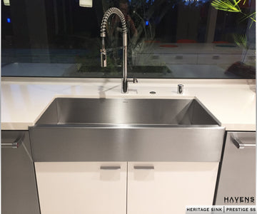 Textured stainless steel farmhouse style kitchen sink. Installed as an undermount, this stainless apron front sink is beautiful. 