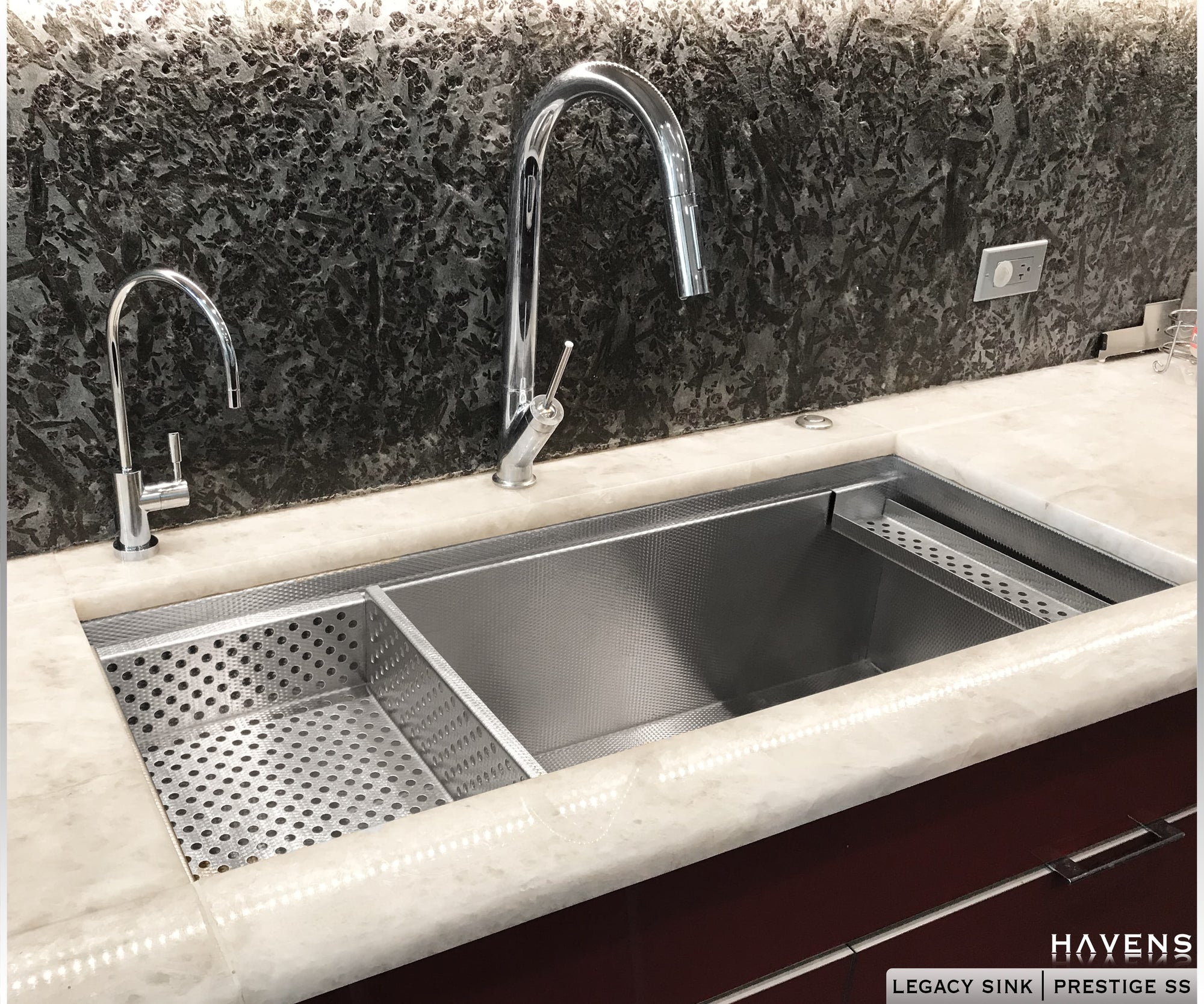 Drop in strainer accessory on left side of sink with advanced luxury sponge caddy on the right side of undermount stainless sink 