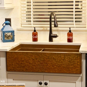 Legacy Farmhouse sink in hammered copper with drop in bowl along advanced sink ledge 