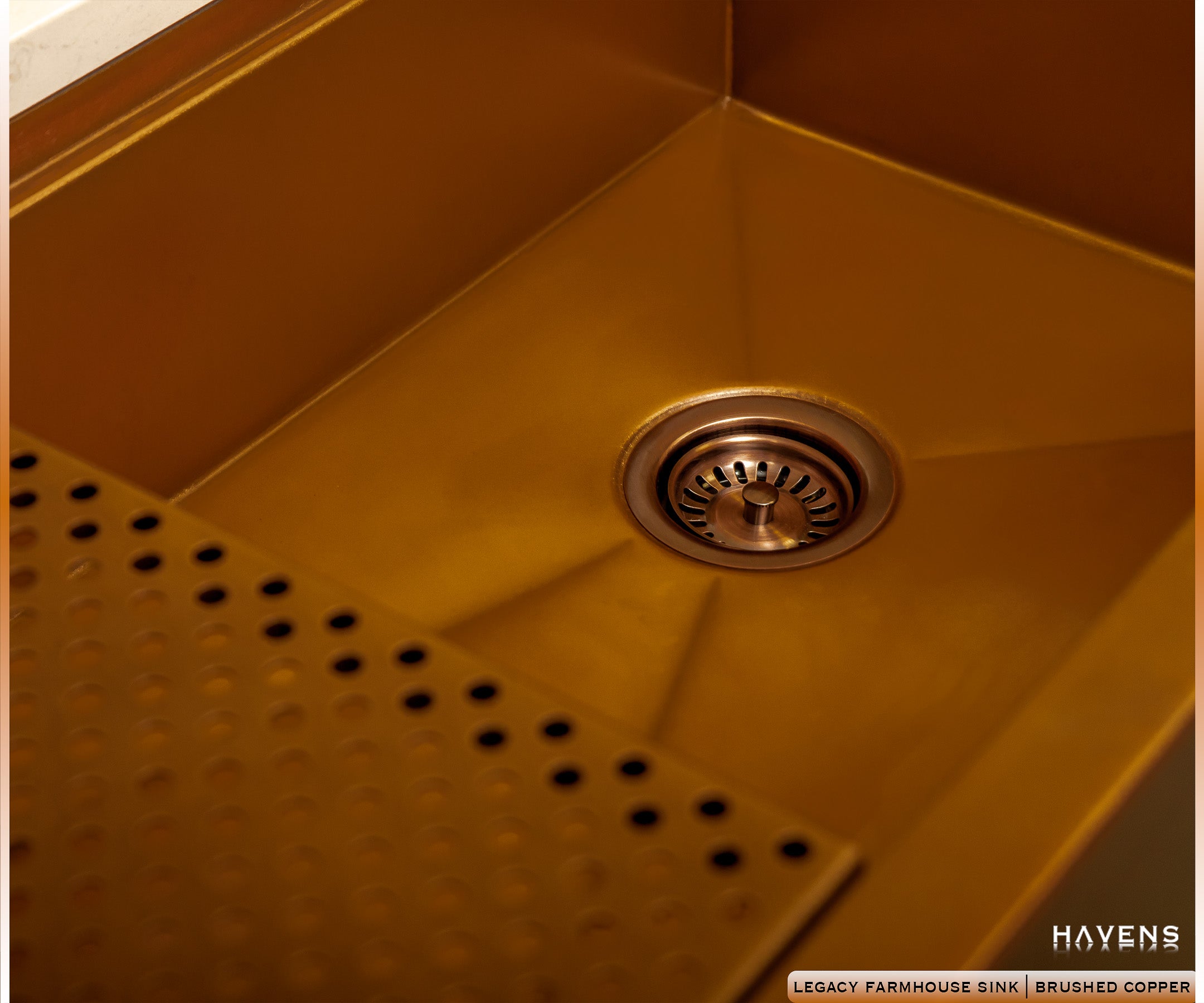 Copper sink with copper sink drain installed off-center on the right