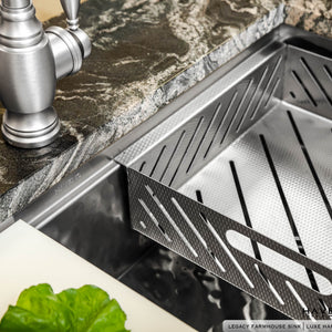 Close up side detail shot of luxury drop in strainer sink accessory in prestige stainless 