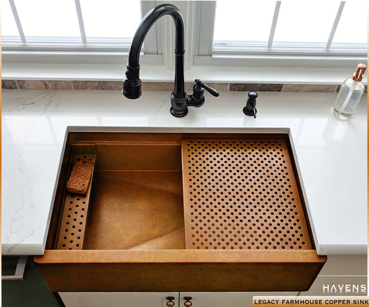 Legacy farmhouse copper kitchen sink with a highly versatile built in ledge.