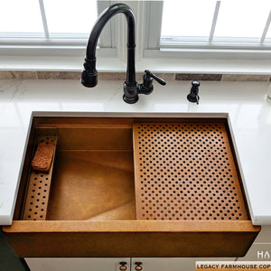 Legacy farmhouse copper kitchen sink with a highly versatile built in ledge.